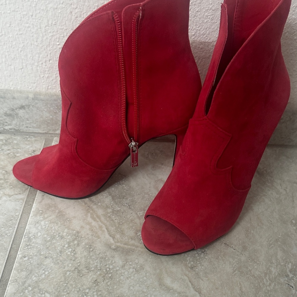 Jessica Simpson Vibrant Red Heeled Boots used once. Excellent condition